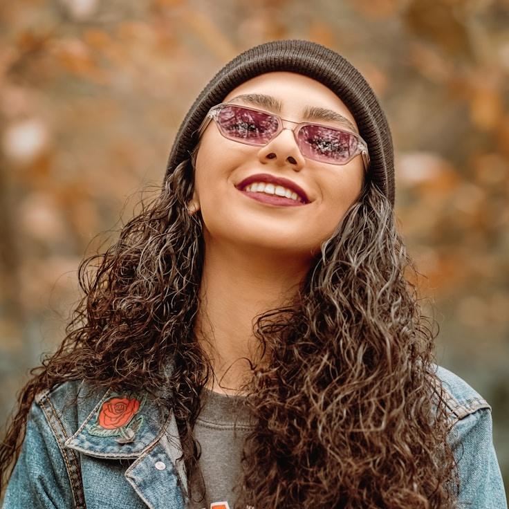 Kaveri Mehta, Lead Design Curator at Willow Bond Studio, reviewing corporate floral arrangements